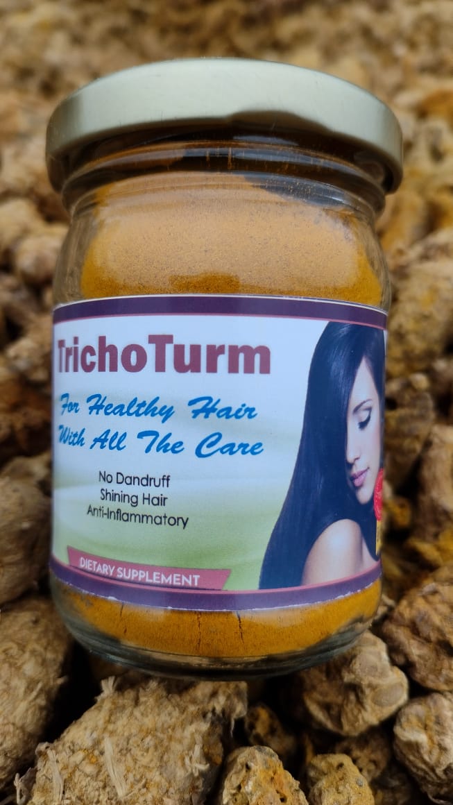 Trichoturm: A turmeric-based dietary supplement for healthy hair, in a white bottle with a green label and a clear cap